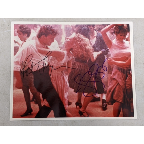 31 - A signed Melanie Griffith photo, a signature cut 3x5 card by Ronald Reagan, a movie still signed by ... 