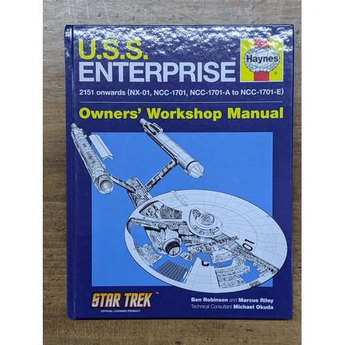 44 - Star Trek models and collectables to include a Haynes USS Enterprise Owners Workshop manual, two box... 