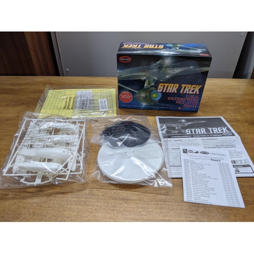 45 - Four Star Trek boxed spacecraft models to include Altamid Swarm Ship, USS Enterprise, USS Enterprise... 