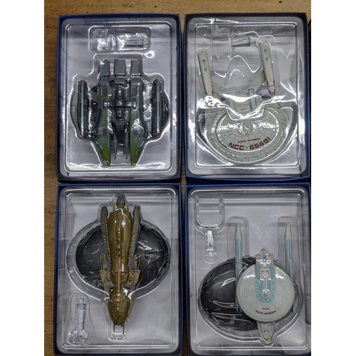 46 - Twelve Star Trek boxed spacecraft models to include Hirogen Holoship, Freedom Class, Vaaduar Fighter... 