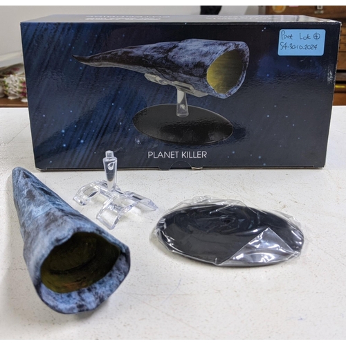 54 - Four Star Trek boxed models to include Planet Killer, Bajoran Lightship, a small model of a Borg Cub... 