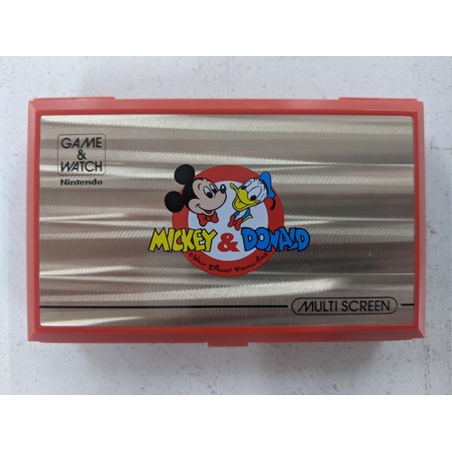 6 - A 1982 Nintendo Game and Watch multi screen Mickey & Donald game with the original box. Box numbered... 