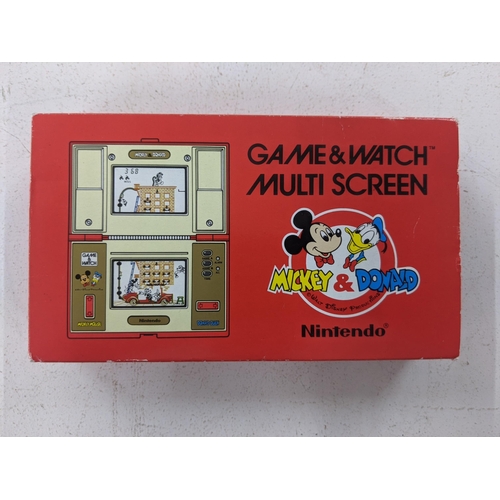 6 - A 1982 Nintendo Game and Watch multi screen Mickey & Donald game with the original box. Box numbered... 