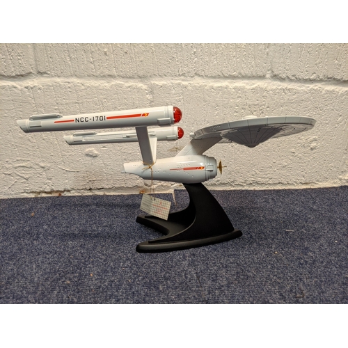 61 - A Franklin Mint Star Trek USS Enterprise NCC-1701 25th Anniversary Edition diecast starship, with di... 