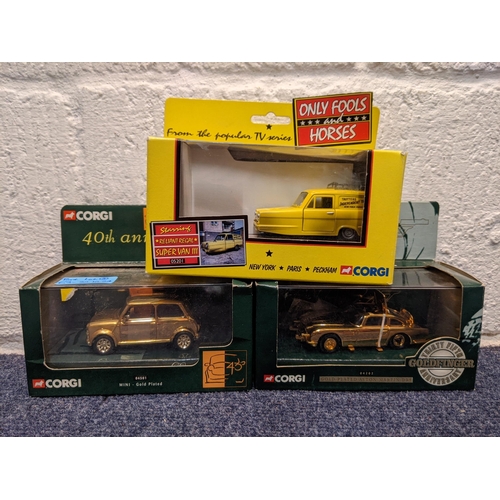 63 - A gold plated boxed Corgi Mini no 04501 commemorating 40th Anniversary of the Mini and a limited edi... 