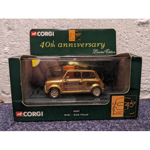 63 - A gold plated boxed Corgi Mini no 04501 commemorating 40th Anniversary of the Mini and a limited edi... 