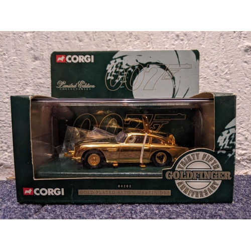 63 - A gold plated boxed Corgi Mini no 04501 commemorating 40th Anniversary of the Mini and a limited edi... 