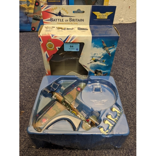 64 - Four boxed models of planes to include a 1990-2000 Battle of Britain commemorative model of a Hawker... 