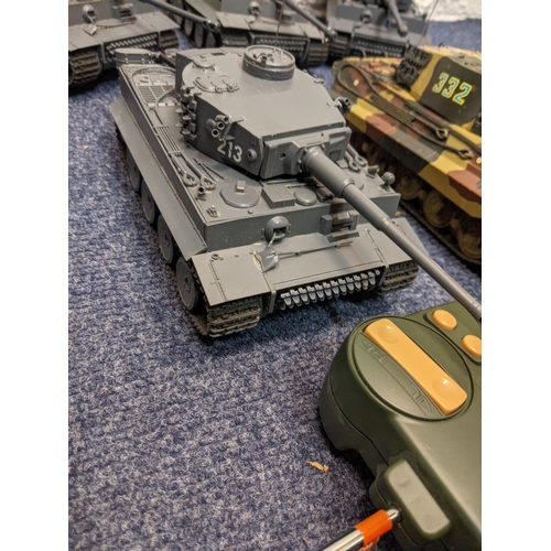 66 - Five Tamiya radio controlled model tanks to include three German tanks, one in camouflage livery
Loc... 