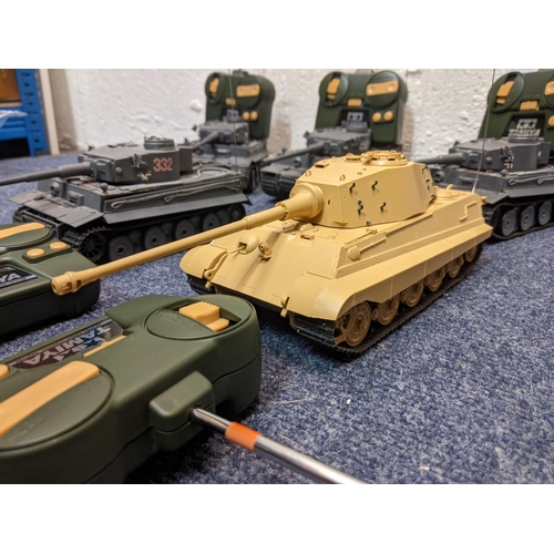 67 - Five Tamiya radio controlled model tanks to include four German tanks, one in desert camouflage live... 