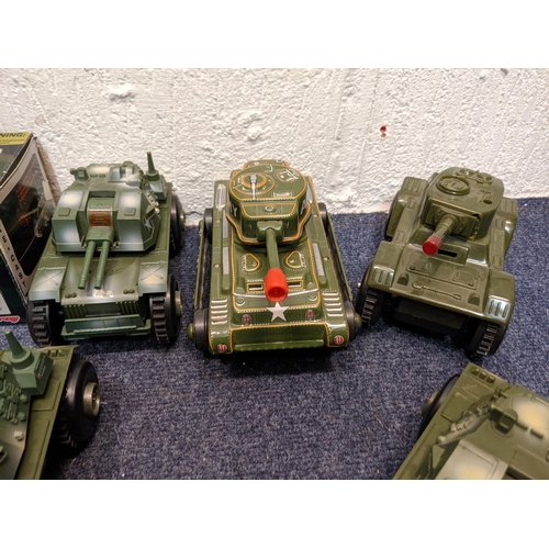 68 - Model tanks and armoured vehicles to include a tin plate tanks, a boxed Military Force King Tiger ta... 