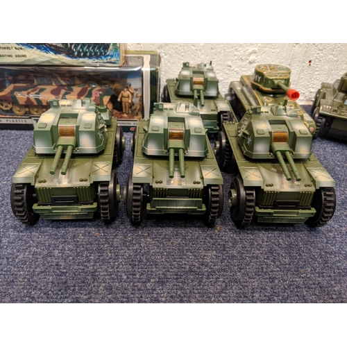 68 - Model tanks and armoured vehicles to include a tin plate tanks, a boxed Military Force King Tiger ta... 