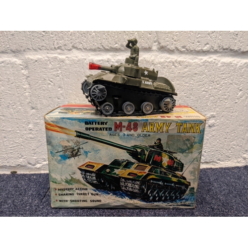 68 - Model tanks and armoured vehicles to include a tin plate tanks, a boxed Military Force King Tiger ta... 