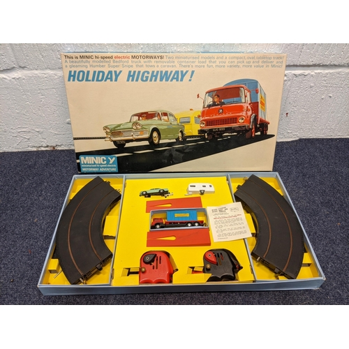 71 - A boxed Minic Holiday Highway miniaturized, high speed motorway adventure
Location:LAF
If there is n... 