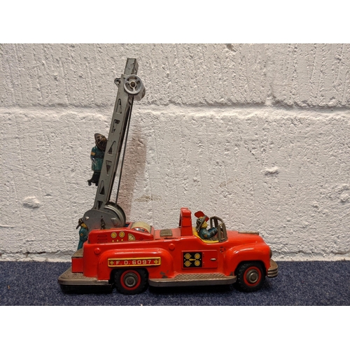 76 - A mid 20th century tin plate, battery operated fire engine, FD 6097
Location:BWR
If there is no cond... 