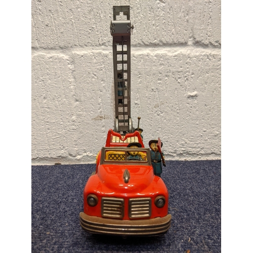 76 - A mid 20th century tin plate, battery operated fire engine, FD 6097
Location:BWR
If there is no cond... 