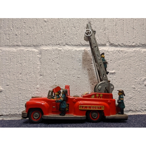 76 - A mid 20th century tin plate, battery operated fire engine, FD 6097
Location:BWR
If there is no cond... 