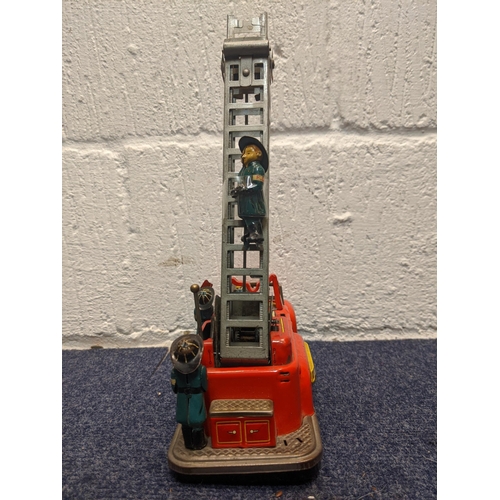 76 - A mid 20th century tin plate, battery operated fire engine, FD 6097
Location:BWR
If there is no cond... 