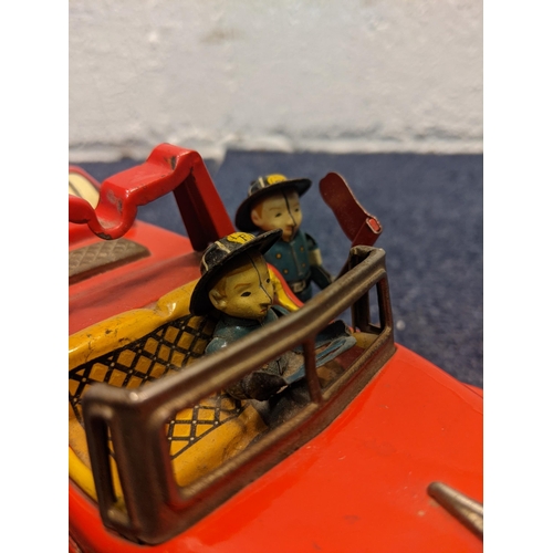 76 - A mid 20th century tin plate, battery operated fire engine, FD 6097
Location:BWR
If there is no cond... 