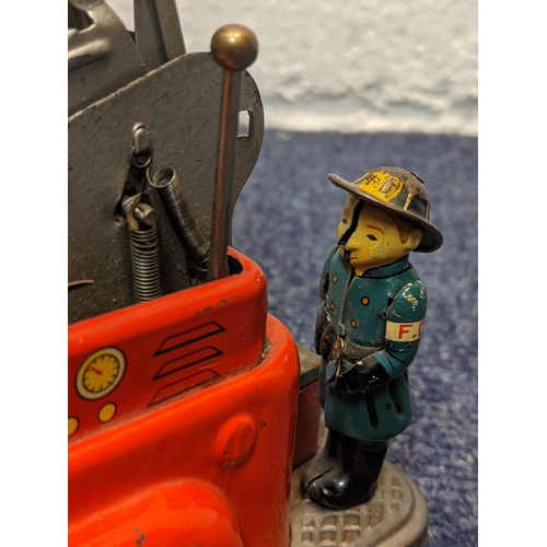 76 - A mid 20th century tin plate, battery operated fire engine, FD 6097
Location:BWR
If there is no cond... 