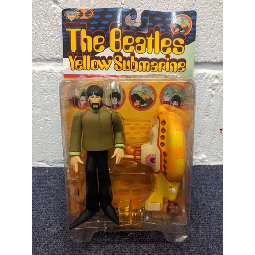 77 - Five McFarlane Toys, The Beatles Yellow Submarine figures to include Paul with Glove and Love Base, ... 