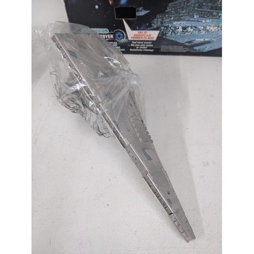 8 - A Star Wars collector fleet electronic Star Destroyer along with a Rebel Blockade Runner both in ori... 