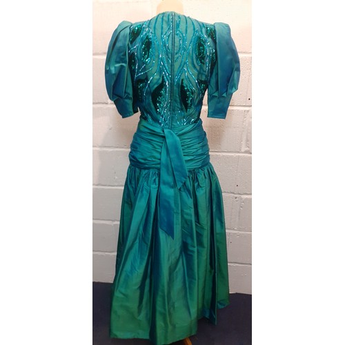 53 - Christina Stambolian, Greek Designer- A 1980's green taffeta silk, made in Paris, a full length gown... 