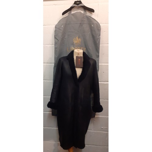 22 - Karl Donoghue-A black cashmere touch calfskin ladies reversible coat, style CMVCTW8 with front press... 