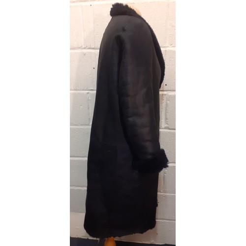 22 - Karl Donoghue-A black cashmere touch calfskin ladies reversible coat, style CMVCTW8 with front press... 