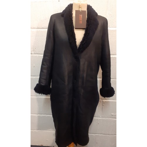 22 - Karl Donoghue-A black cashmere touch calfskin ladies reversible coat, style CMVCTW8 with front press... 