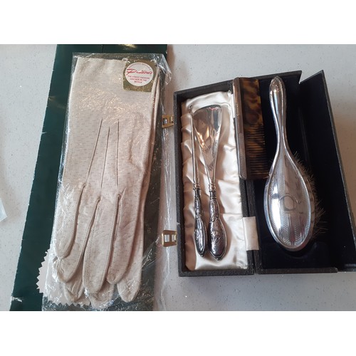 87 - Collectables to include a pair of mid 20th Century ladies cream leather gloves, unused, a boxed chil... 