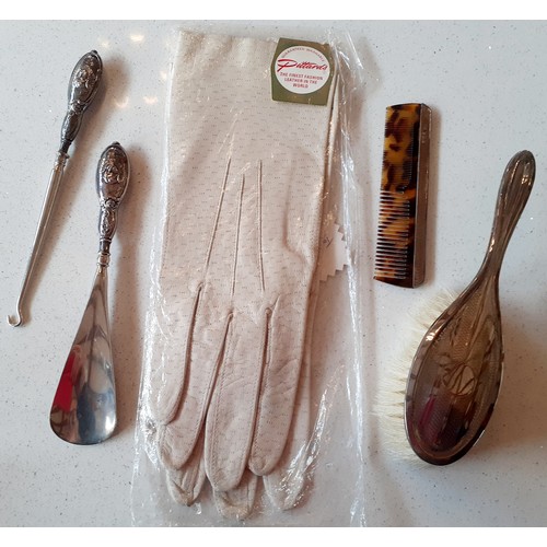 87 - Collectables to include a pair of mid 20th Century ladies cream leather gloves, unused, a boxed chil... 