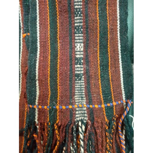 79 - A mid 20th Century Tibetan woven goat wool sash/Kaabo used to tie and secure the national attire cal... 