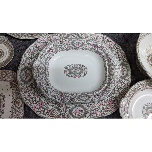 288 - A Minton Pekin Scroll part dinner service including platters, tureens and other items.
Location: 10-... 