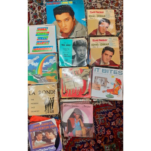 188 - A quantity of LP's and 45rpm singles, mainly 1960's-1970's to include Elvis, Fleetwood Mac, Paul McC... 