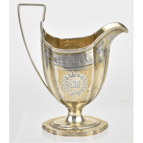 52 - A George III silver cream jug on stand, London between 1797 and 1810, date letter partially rubbed, ... 