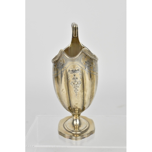 52 - A George III silver cream jug on stand, London between 1797 and 1810, date letter partially rubbed, ... 