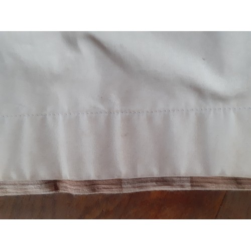 102 - A pair of full length thick cotton curtains in tan and cream check having a  black out lining and ri... 