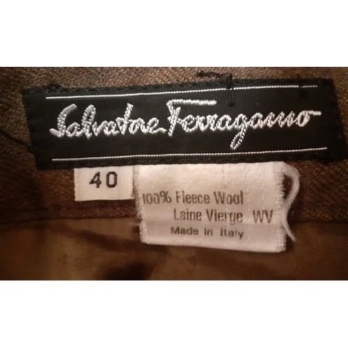 24 - Salvatore Ferragamo and Fendi-Two ladies skirts comprising a Ferragamo brown pleated fleece wool ski... 