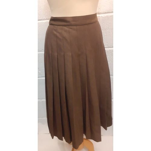 24 - Salvatore Ferragamo and Fendi-Two ladies skirts comprising a Ferragamo brown pleated fleece wool ski... 