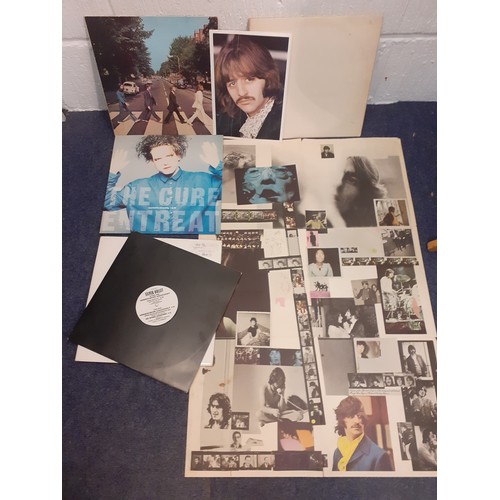 179 - A small quantity of records and related items to include a 1969 Beatles 'Abbey Road' (matrix PCS 708... 