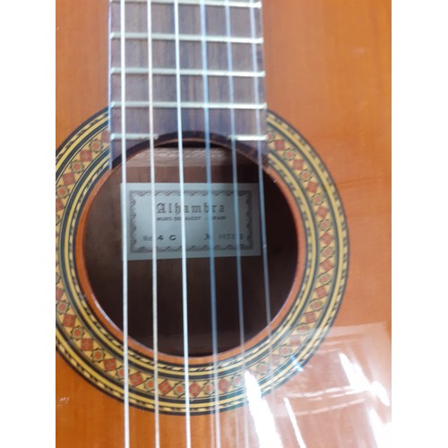 177 - A Spanish Alhambra 4C classical guitar in fitted case. Location:RWF
If there is no condition report,... 