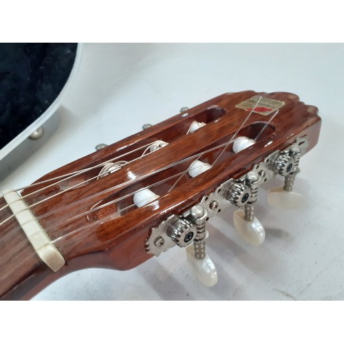 177 - A Spanish Alhambra 4C classical guitar in fitted case. Location:RWF
If there is no condition report,... 