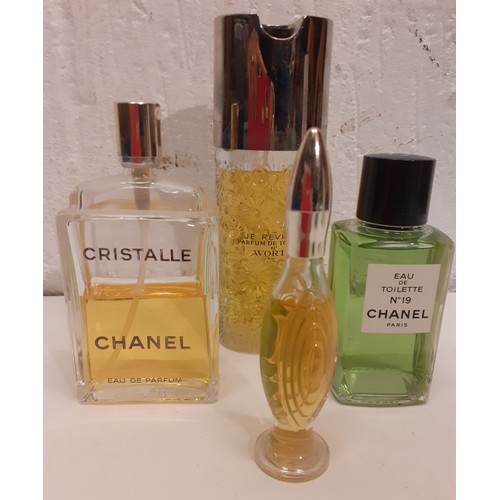 110 - A quantity of fragrances and scent bottles to include Chanel No19 Eau de Toilette, a partial bottle ... 