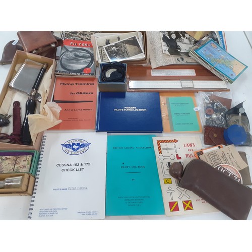 457 - A mixed lot comprising photography accessories and ephemera, vintage postcards and photos, aviation ... 