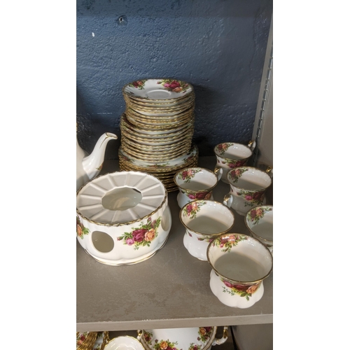 1 - A Royal Albert Old Country Roses dinner and tea service to include two tureens, platter, dinner plat... 