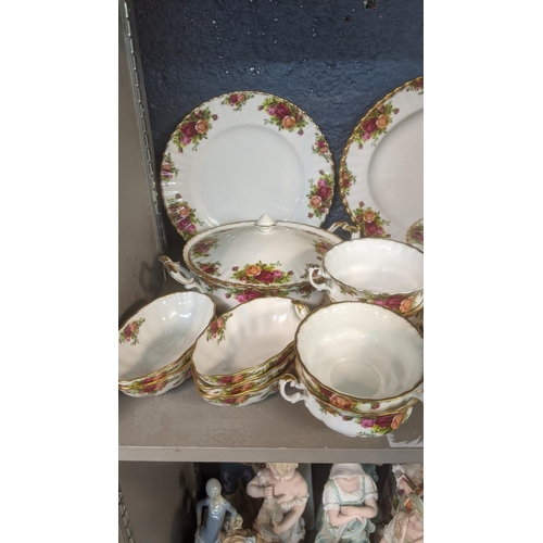 1 - A Royal Albert Old Country Roses dinner and tea service to include two tureens, platter, dinner plat... 