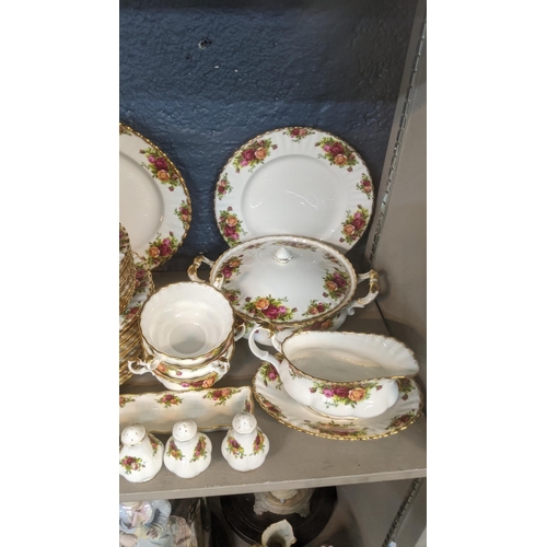 1 - A Royal Albert Old Country Roses dinner and tea service to include two tureens, platter, dinner plat... 