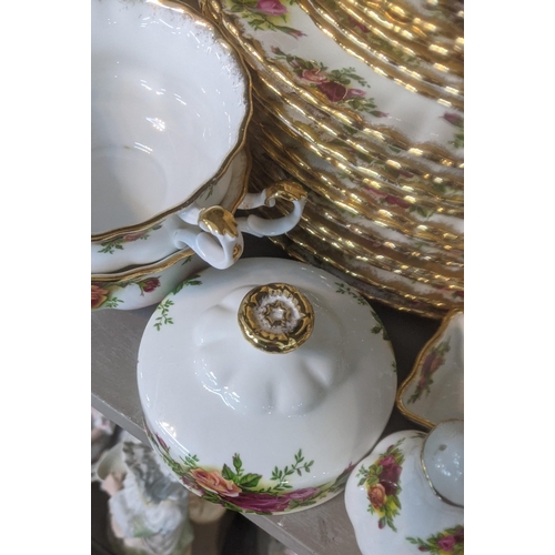 1 - A Royal Albert Old Country Roses dinner and tea service to include two tureens, platter, dinner plat... 