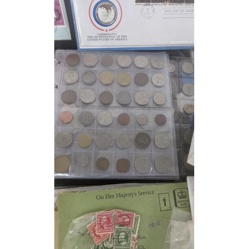 163 - A quantity of first day covers together with mainly British stamps loose and an album of coins form ... 